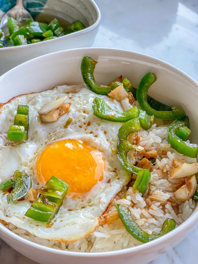 fried egg and rice with jalapeno grlic sauce