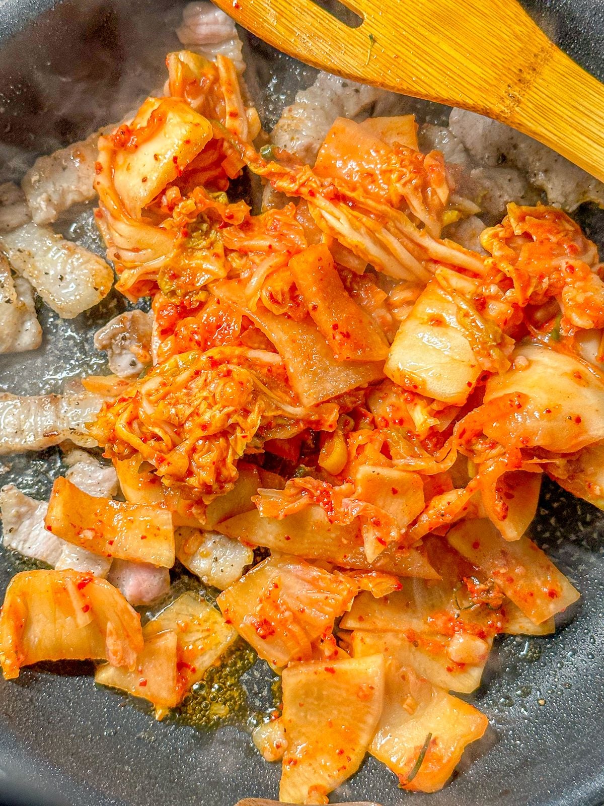Stir fried kimchi with pork.