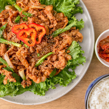 spicy pork bulogi with lettuce kimchi and white rice