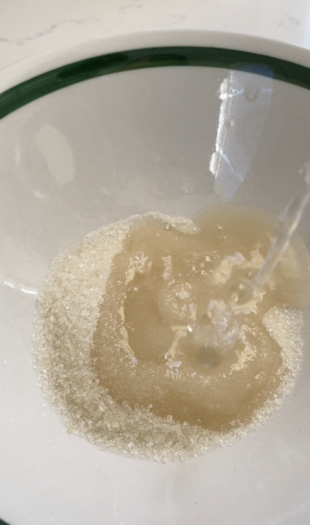 melt sugar in warm water & mix to dissolve