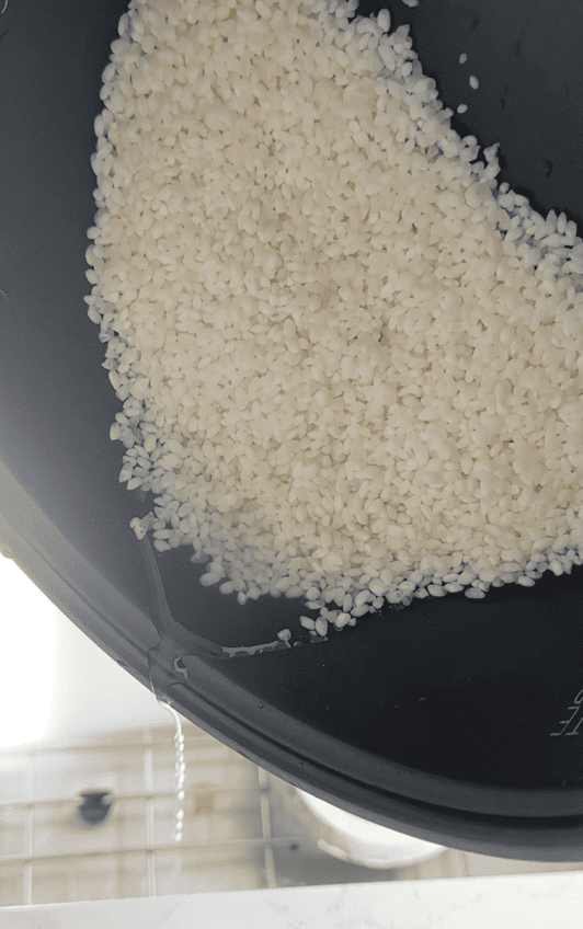 strain water from the rice as much as possible