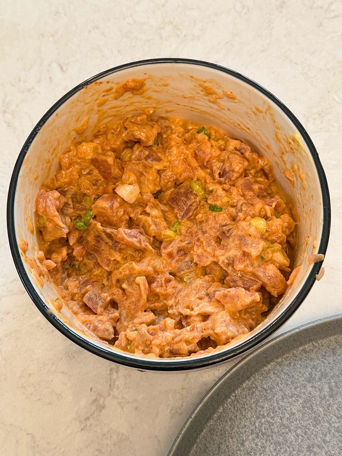 Mixed tuna in a bowl.