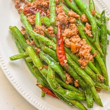 A plate of stir-fried green beans.